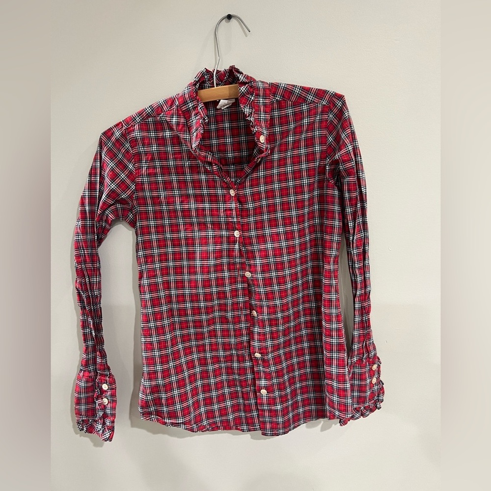 Red and white plaid button-down shirt with ruffled cuffs and collar